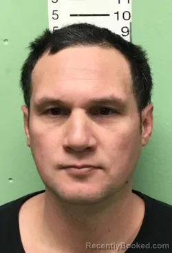 Mugshot of GEORGE KANA'IAUPUNI SARKISSIAN booked in Bryan County, Oklahoma on March 12, 2026