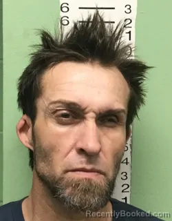 Mugshot of DENNIS AARON TRAMEL booked in Bryan County, Oklahoma on March 16, 2026