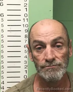 Mugshot of MICHAEL ALLEN MOORE booked in Bryan County, Oklahoma on March 27, 2026