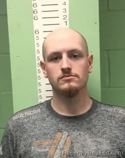 Mugshot of AUSTIN LEE BURNETT booked in Bryan County, Oklahoma on March 27, 2026