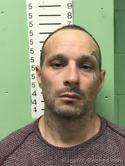 Mugshot of TOMMY RAY ESPINOZA booked in Bryan County, Oklahoma on April 2, 2026