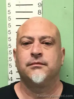 Mugshot of JOSHUA DALE DENNIE booked in Bryan County, Oklahoma on April 23, 2026