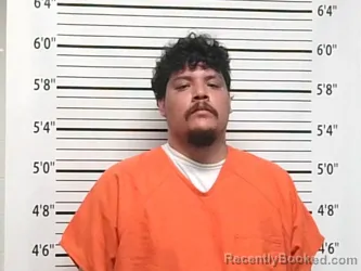 Mugshot of ENRIQUE MIGALE RODRIGUEZ booked in Caddo County, Oklahoma on March 22, 2026