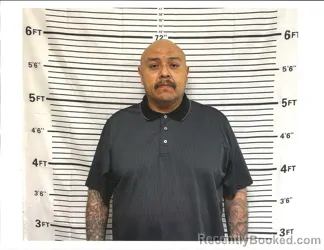 Mugshot of REUBEN LATRELL WABAUNASEE booked in Caddo County, Oklahoma on April 1, 2026