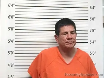 Mugshot of CHARLES ROANHORSE POOLAW booked in Caddo County, Oklahoma on April 2, 2026