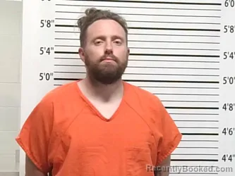 Mugshot of TALON BENJAMIN UPTON booked in Caddo County, Oklahoma on April 3, 2026