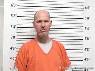 Mugshot of STEVEN CURNETT booked in Caddo County, Oklahoma on April 8, 2026