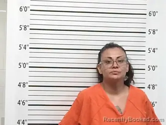 Mugshot of TIFFANY DAWN TWOHATCHET booked in Caddo County, Oklahoma on April 8, 2026