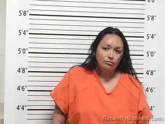 Mugshot of CARRIE MAKAH KLINEKOLE booked in Caddo County, Oklahoma on May 21, 2026