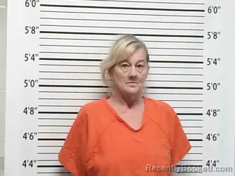 Mugshot of AMY CHRISTINE DEVILBISS booked in Caddo County, Oklahoma on June 2, 2026