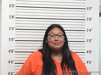 Mugshot of TATUM LYN HARRIS booked in Caddo County, Oklahoma on June 19, 2026