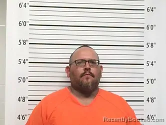 Mugshot of DUSTY AUGUSTIN AREBALO booked in Caddo County, Oklahoma on July 9, 2026