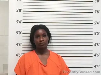 Mugshot of NIASIA KIWONA LEI GRENADA booked in Caddo County, Oklahoma on July 14, 2026