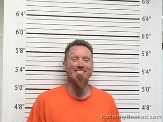 Mugshot of Garrett Ray Brown booked in Caddo County, Oklahoma on August 19, 2026