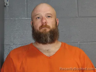 Mugshot of JUSTIN WAYNE NOLAN booked in Canadian County, Oklahoma on April 24, 2026