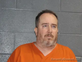 Mugshot of JOSHUA KURTIS CRISSINGER booked in Canadian County, Oklahoma on May 7, 2026