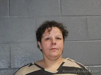 Mugshot of ANGEL DAWN BEVILL booked in Canadian County, Oklahoma on May 8, 2026