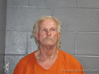 Mugshot of JOHNNY ALLEN MANOS booked in Canadian County, Oklahoma on May 14, 2026