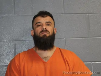 Mugshot of MOHAMMAD JAMEEL OWDETALLAH booked in Canadian County, Oklahoma on June 5, 2026