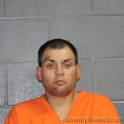 Mugshot of CHRISTIAN WADE MCCLOURE booked in Canadian County, Oklahoma on June 23, 2026