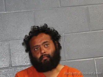 Mugshot of ALONZO GARZA booked in Canadian County, Oklahoma on June 30, 2026