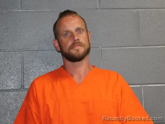 Mugshot of JOHN MORGAN DAVIS booked in Canadian County, Oklahoma on July 4, 2026