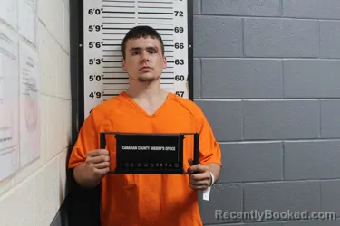 Mugshot of CHRISTIAN MIKEL HEGER booked in Canadian County, Oklahoma on July 5, 2026