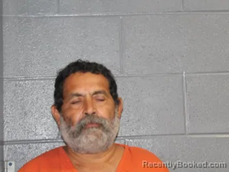 Mugshot of MANUEL ALMAGUER DIAZ booked in Canadian County, Oklahoma on July 7, 2026