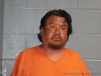 Mugshot of JOSHUA WAYNE NEVAQUAYA booked in Canadian County, Oklahoma on July 14, 2026