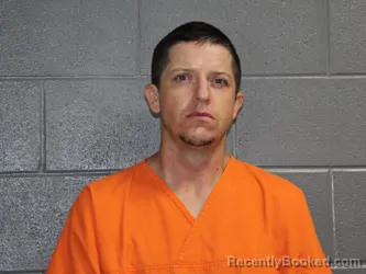 Mugshot of Justin Kirk Davis booked in Canadian County, Oklahoma on July 26, 2026