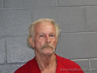 Mugshot of Johnny Allen Manos booked in Canadian County, Oklahoma on August 28, 2026