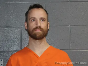 Mugshot of Iszac Holland Marchant booked in Canadian County, Oklahoma on August 31, 2026