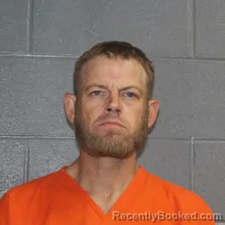 Mugshot of Jessy James Batchelor booked in Canadian County, Oklahoma on October 23, 2026