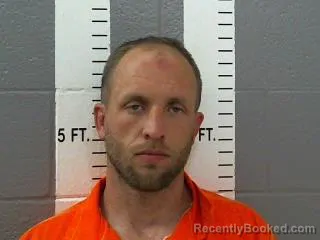 Mugshot of CODY TYLER EVANS