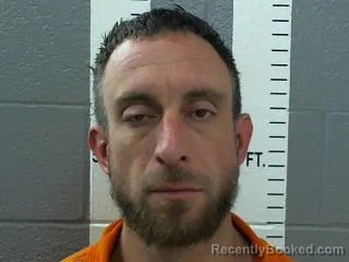 Mugshot of ETHAN MCCANTS TOLLISON booked in Carter County, Oklahoma on April 4, 2026