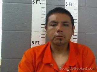 Mugshot of MITCHELL COURTNEY TORRALBA booked in Carter County, Oklahoma on August 4, 2026