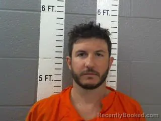 Mugshot of Justin Everett Harris booked in Carter County, Oklahoma on August 11, 2026