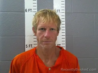 Mugshot of Travis Allen Hickman booked in Carter County, Oklahoma on October 2, 2026