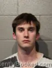 Mugshot of AIDAN SCOTT KRAVER booked in Cleveland County, Oklahoma on April 22, 2026
