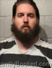 Mugshot of AUSTIN JOE SNOW booked in Cleveland County, Oklahoma on May 14, 2026