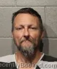 Mugshot of BRIAN ERICK SCOGGINS booked in Cleveland County, Oklahoma on April 22, 2026