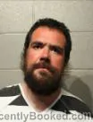 Mugshot of CALEB ANDREW BURKETT booked in Cleveland County, Oklahoma on April 16, 2026