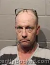 Mugshot of CHARLES NICHOLAS HEDRICK booked in Cleveland County, Oklahoma on May 22, 2026
