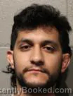 Mugshot of CHRISTIAN MATEO MCCLAIN booked in Cleveland County, Oklahoma on June 18, 2026
