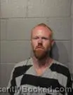 Mugshot of DEREK DAVID JONES booked in Cleveland County, Oklahoma on July 12, 2026