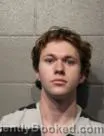 Mugshot of JAKE MICHAEL KREINS booked in Cleveland County, Oklahoma on May 9, 2026