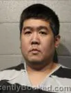 Mugshot of JIANG WENZHI booked in Cleveland County, Oklahoma on May 19, 2026