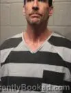 Mugshot of MATTHEW KEATON WOMACK booked in Cleveland County, Oklahoma on April 18, 2026