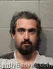 Mugshot of NICOLAUS JAMES ADAMS booked in Cleveland County, Oklahoma on April 19, 2026