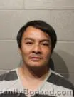 Mugshot of ROEUN CHOUN booked in Cleveland County, Oklahoma on May 25, 2026